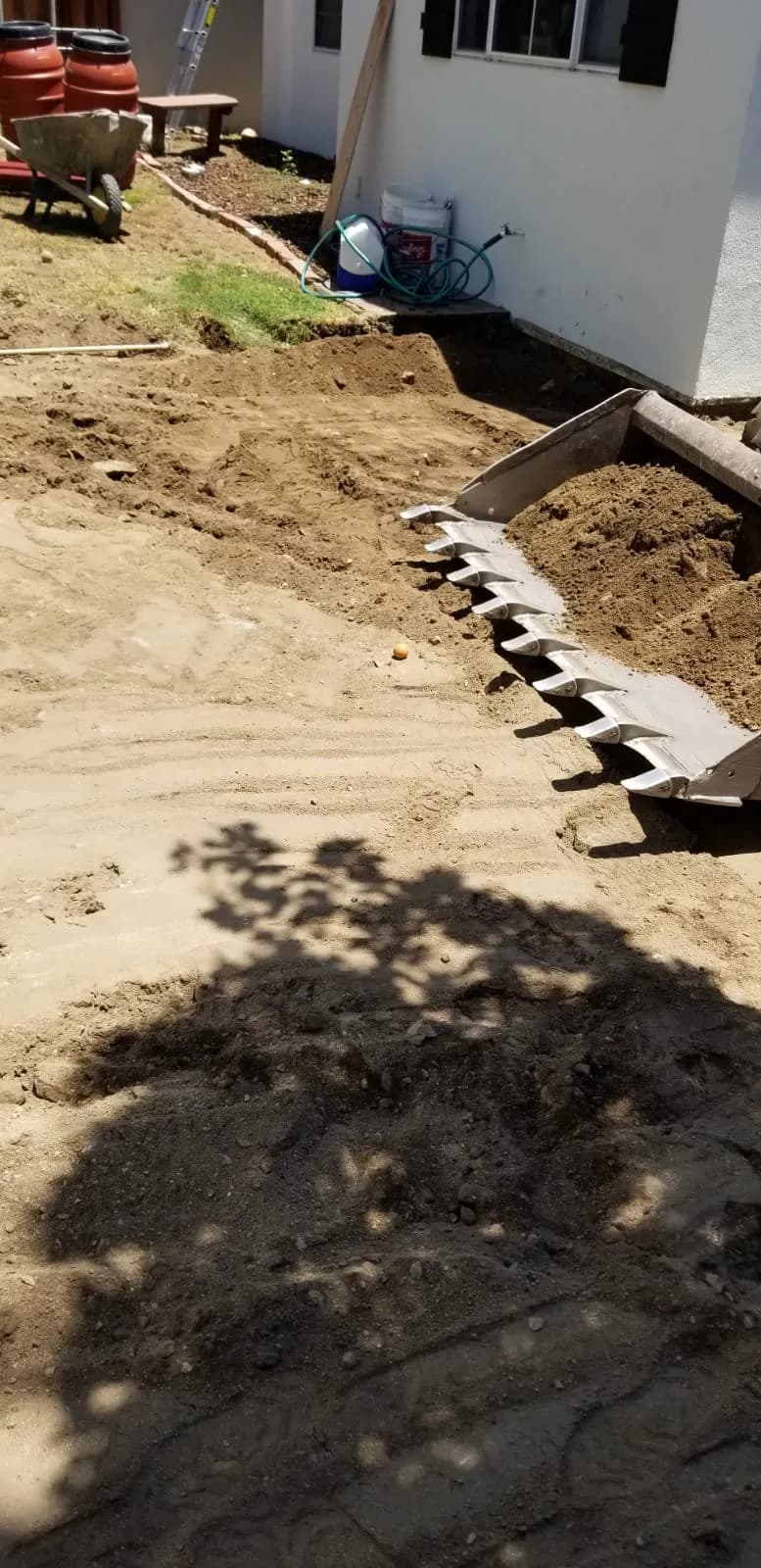 Excavation for the paver base by T&N Remodeling